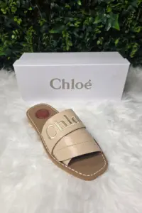 Nude embroidered slides